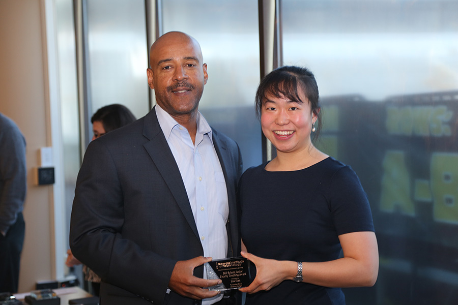 Iris Tien receives her award from School Chair Reginald DesRoches. (Photo: Jess Hunt-Ralston)